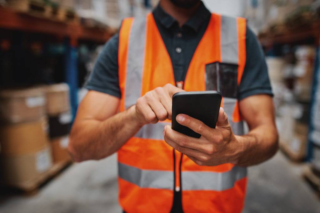 Warehouse worker on a mobile device